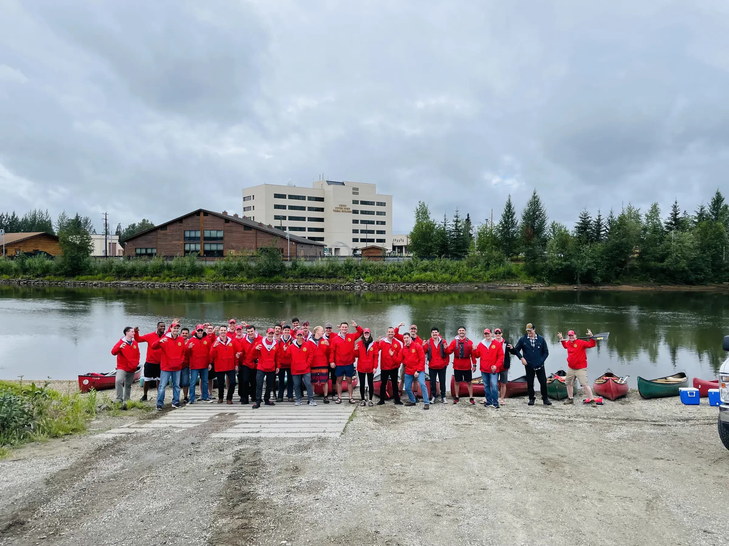 Large group of Canoe Alaska boats ready for a Chena River outing